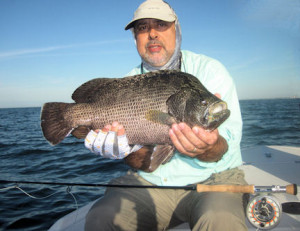 Patrice Camillieri, from France, caught and released this big tripletail on a Grassett Flats Minnow fly while fishing the coastal gulf with Capt. Rick Grassett in December.
